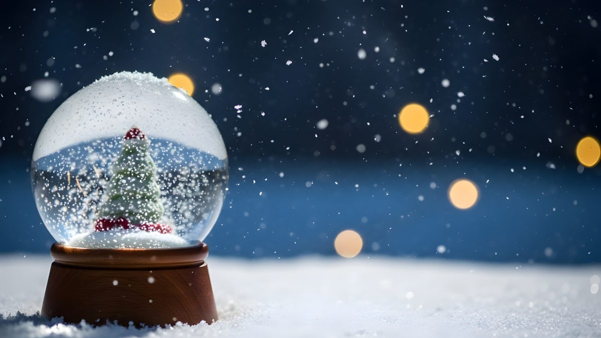 Christmas snow globe with miniature pine tree on snowy surface with glowing bokeh background stock photo