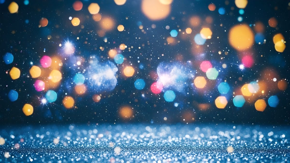 Festive christmas background with blue glitter floor and colorful glowing bokeh lights for holidays stock photo
