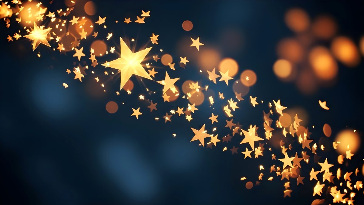 Golden star shapes floating on dark blue background for festive celebration and holiday design stock photo